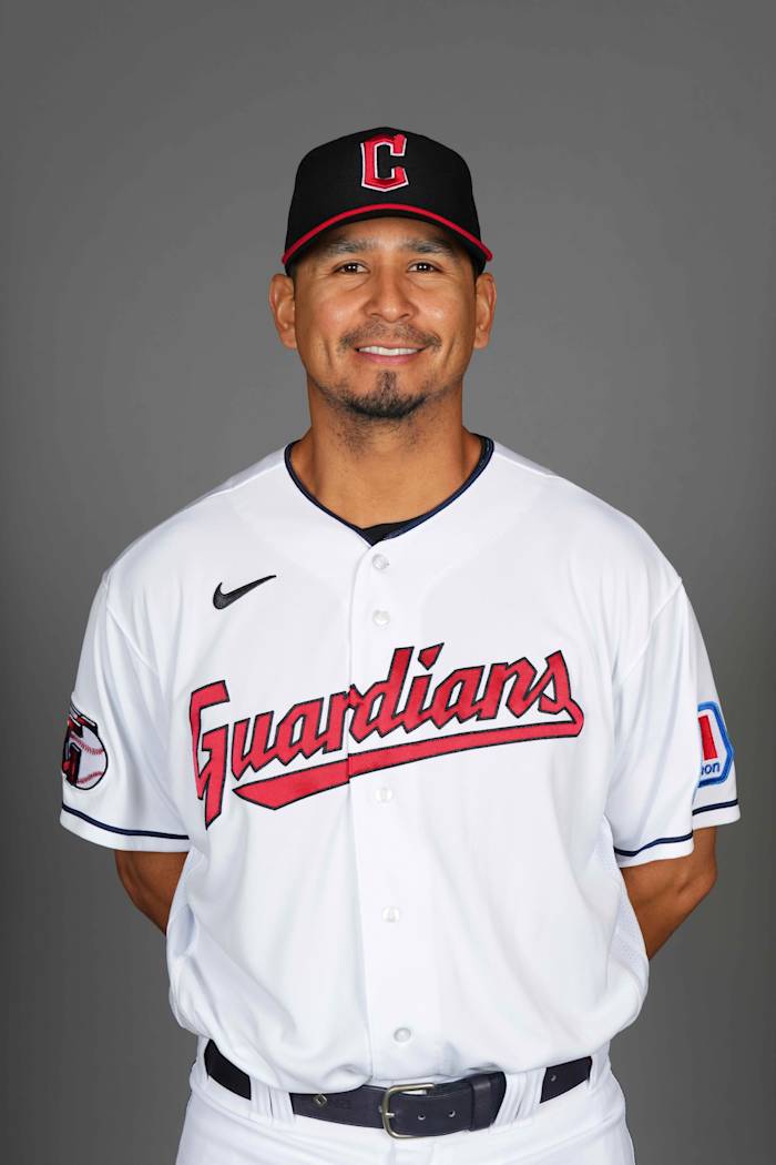 Feb 22, 2024; Goodyear, AZ, USA; Cleveland Guardians player Carlos Carrasco poses for a photo during Media Day at the Cleveland Guardians Spring Training Facility.